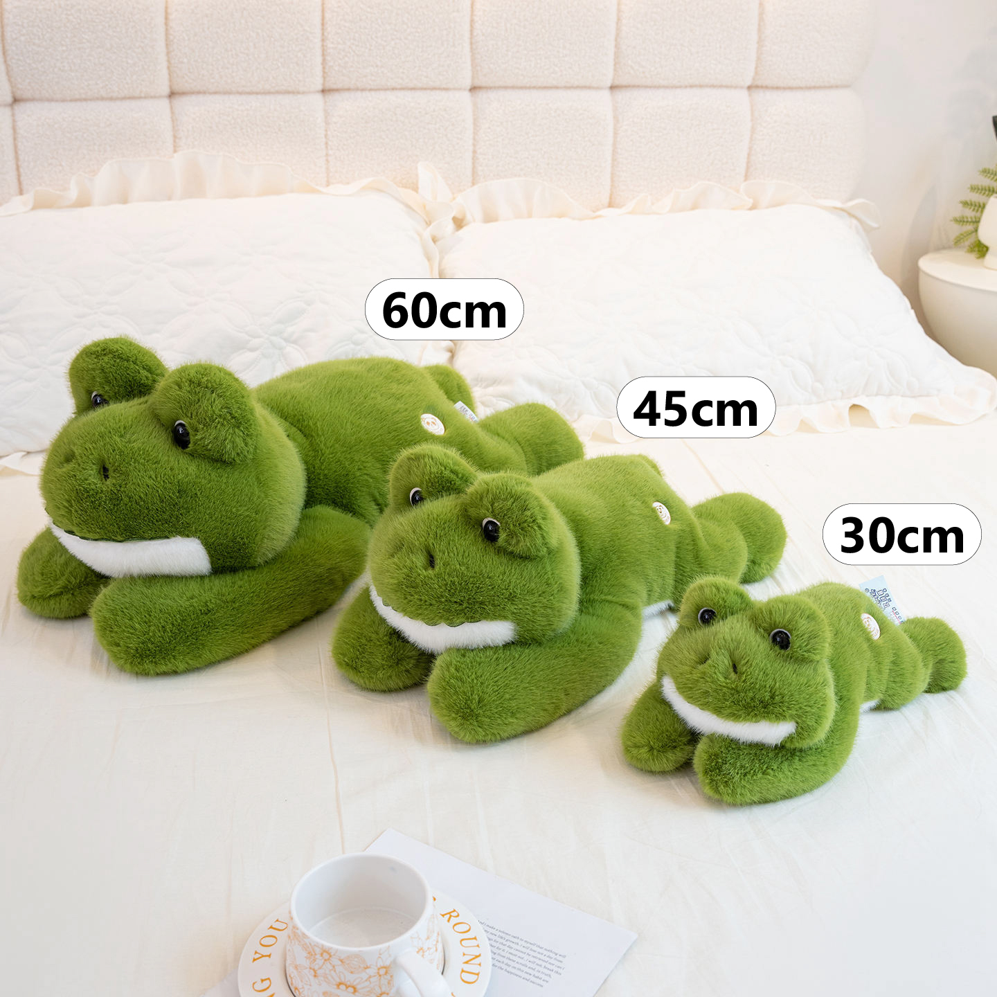 Cute Frog Plush Toy available in 30 cm, 45 cm, and 60 cm sizes, featuring a fluffy lying frog design for cuddling and display