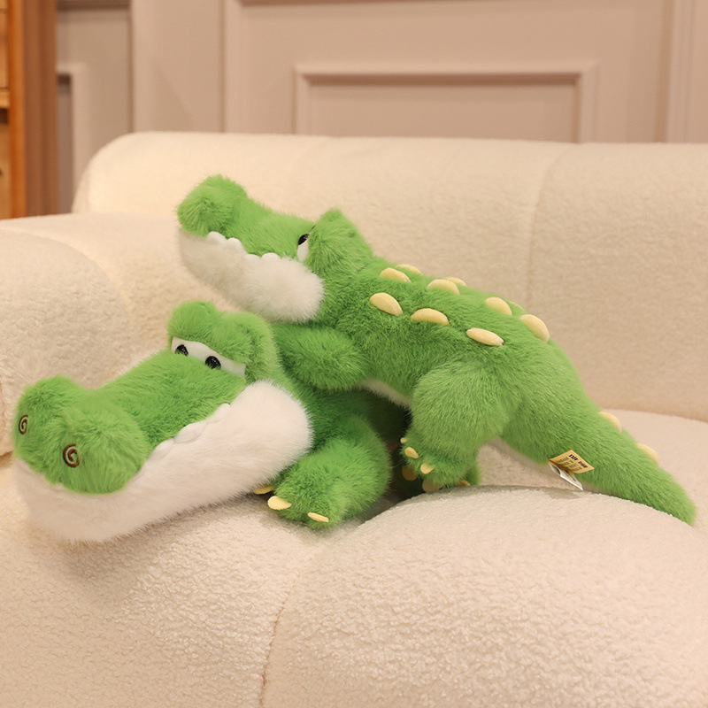 Cute Crocodile Plush Toys resting on a cozy sofa, featuring soft plush fabric, fluffy texture, and playful crocodile-inspired details