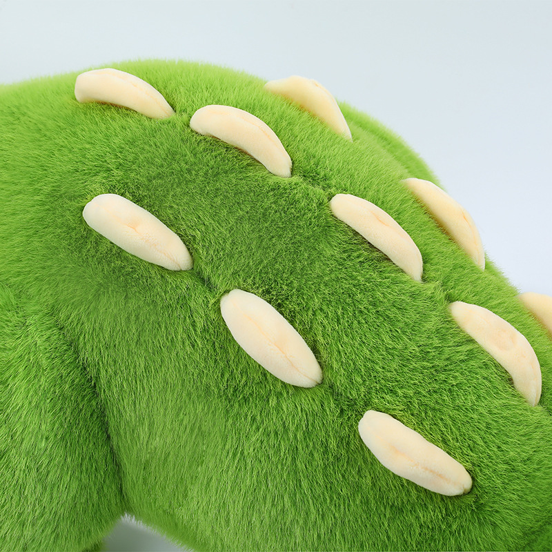 Cute Crocodile Plush Pillow featuring soft plush fabric and raised back spikes that add texture and character to the crocodile design