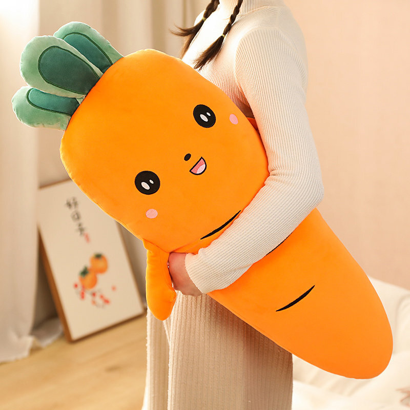 Yellow Carrot Plush Pillow featuring soft plush fabric, a cheerful smiling expression, and a huggable carrot-shaped design