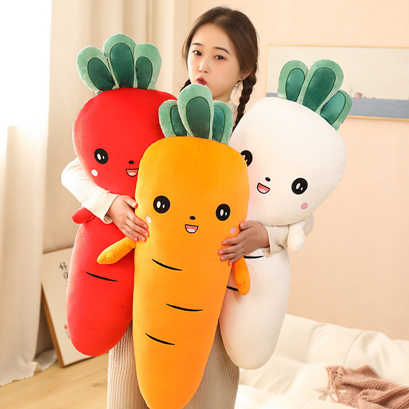 Cute Carrot Plush Pillows in three color variations featuring embroidered facial details, plush texture, and a playful vegetable-inspired design