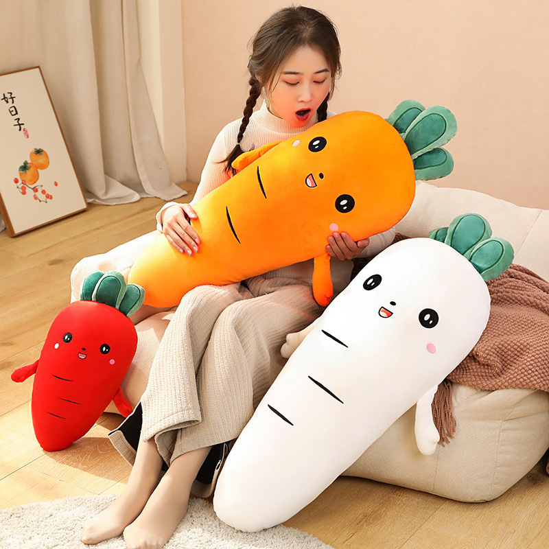 Cute Carrot Plush Pillows in yellow, red, and white colors arranged in a cozy living space, showcasing soft plush fabric and cheerful smiling faces