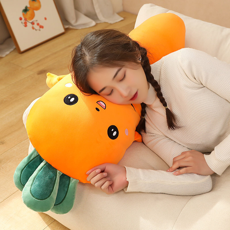 Soft yellow Carrot Plush Pillow used as a cozy cushion for resting and relaxing on a sofa