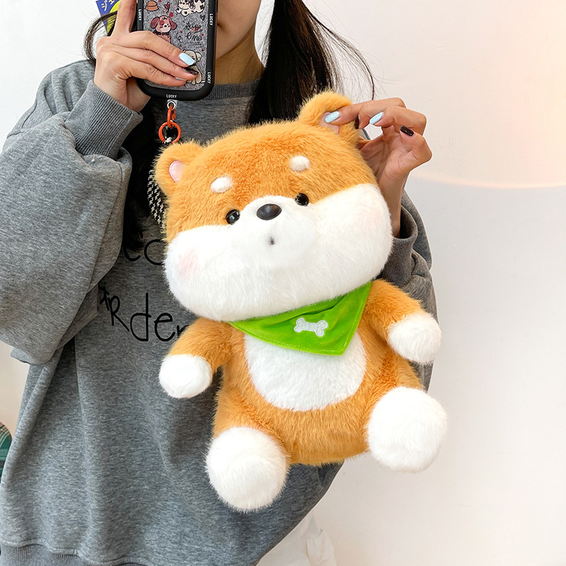 Shiba Inu plush toy with a green bandana highlighting its rounded shape, plush texture, and charming decorative appeal