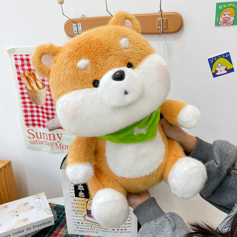Shiba Inu plush toy with a green bandana highlighting its rounded shape, plush texture, and cozy decorative appeal