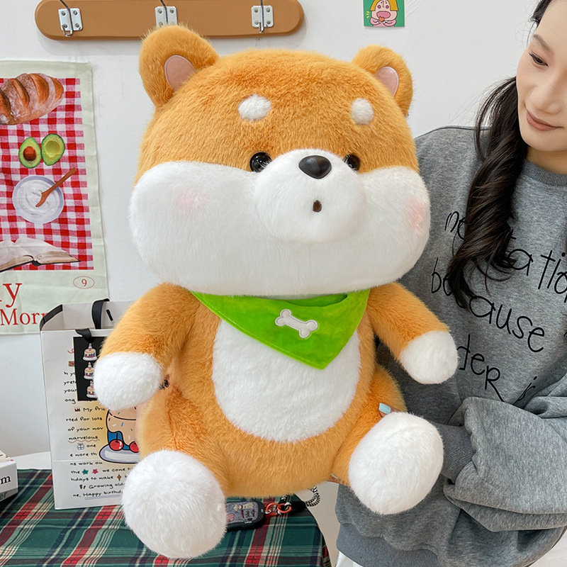 Shiba Inu plush toy with a green bandana featuring soft plush fabric, rounded body, and cuddly sitting design