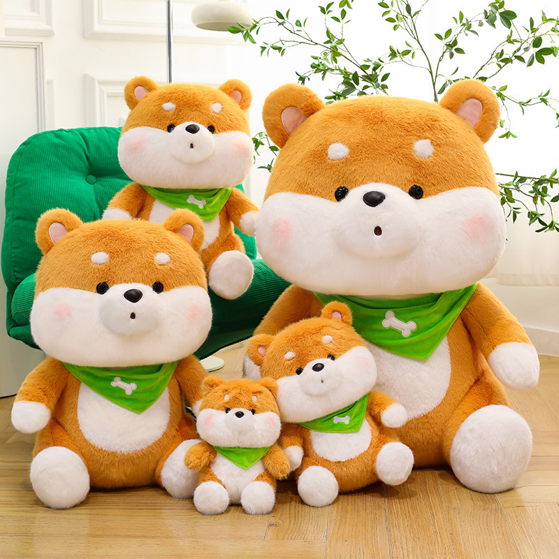 Shiba Inu plush toys with green bandanas displayed in multiple sizes for collecting and decorating