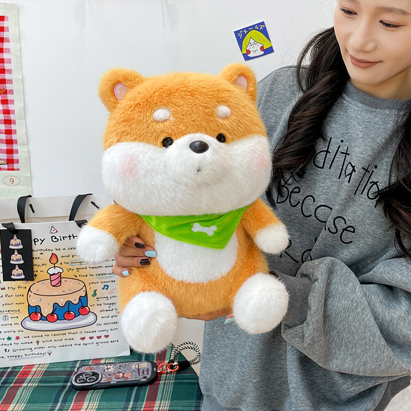 Shiba Inu plush toy with a green bandana featuring fluffy plush fabric, soft stuffing, and a cuddly sitting design