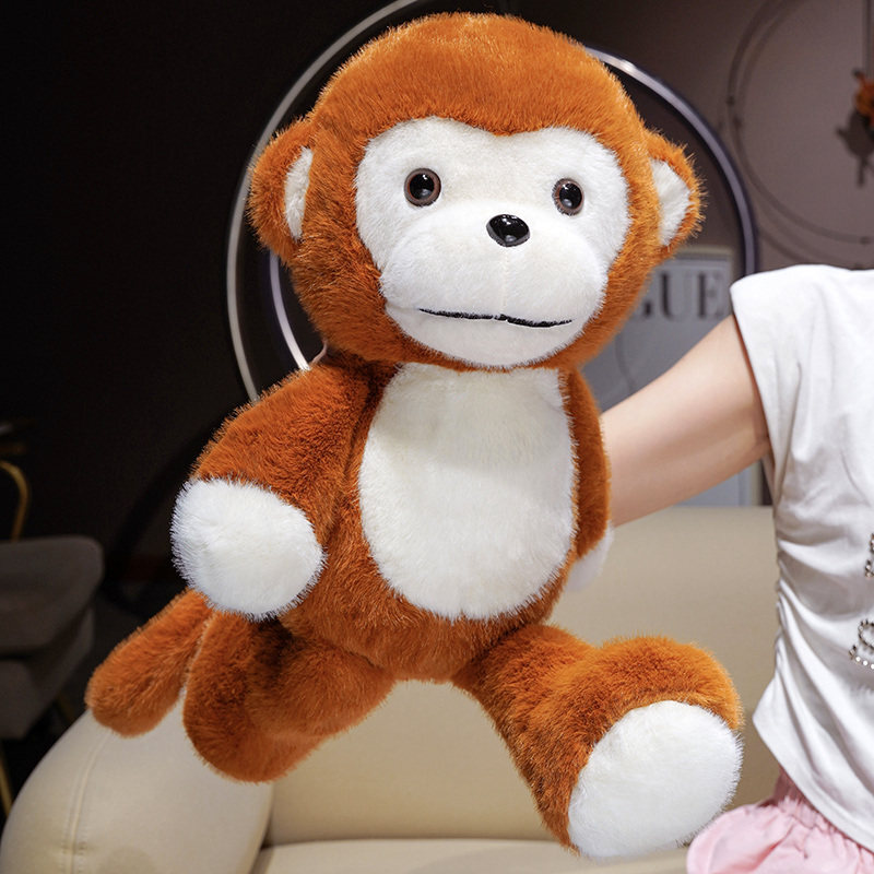 Cute Monkey Plush Toy with swinging arms and legs, highlighting its playful pose and soft plush texture