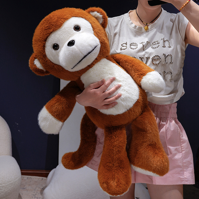 Cute Monkey Plush Toy with soft plush fabric and swinging limbs, showcasing its playful monkey design and cuddly appearance