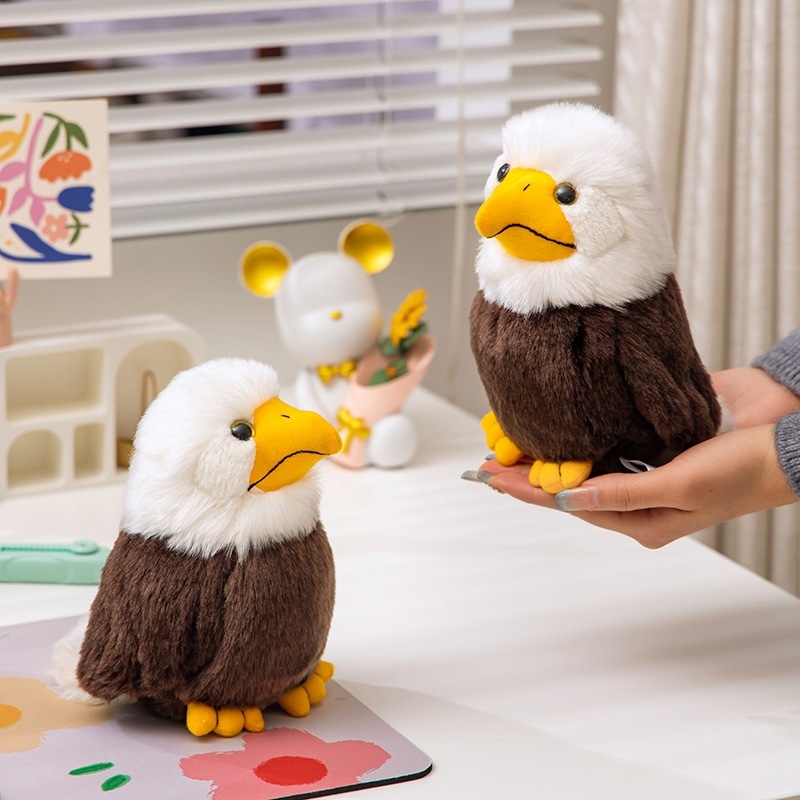 Bald Eagle Plush Toy displayed on a desk with soft fluffy feathers, yellow beak, and wildlife-inspired design, perfect for shelves, workspaces, and home decor