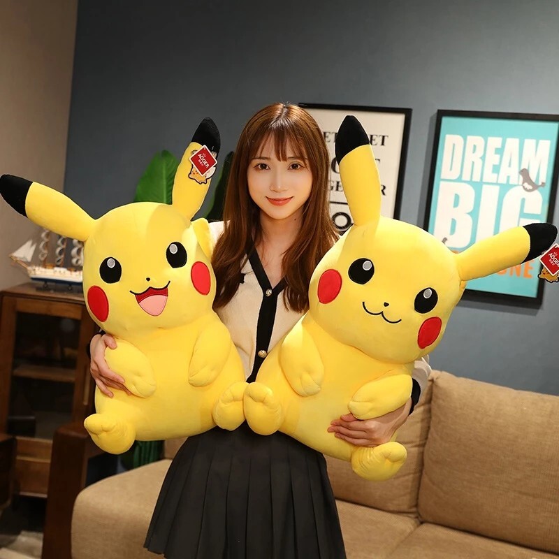 Official Pokemon Licensed Pikachu Plush Toys in Happy and Classic styles displayed together, showcasing their soft plush fabric and multiple size options