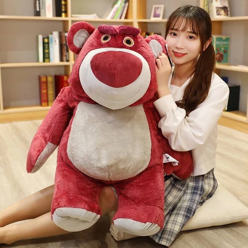 Official Disney Pixar Lotso Huggin Bear plush toy with soft plush fabric, perfect for cuddling, relaxing, and home decor