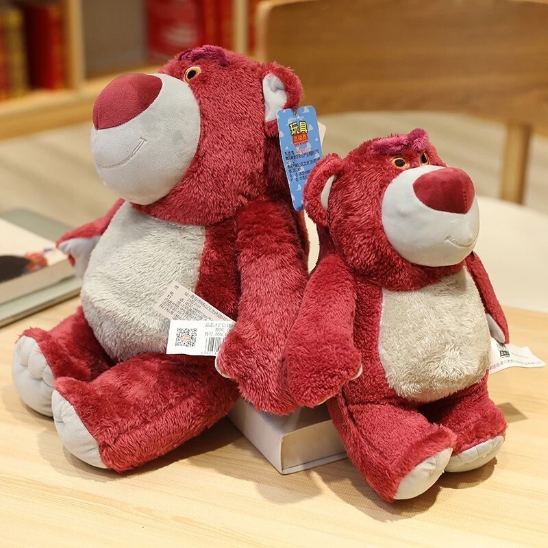Aoger Official Disney Pixar Lotso Huggin Bear plush toys showcasing two sizes with embroidered details and soft plush fabric.