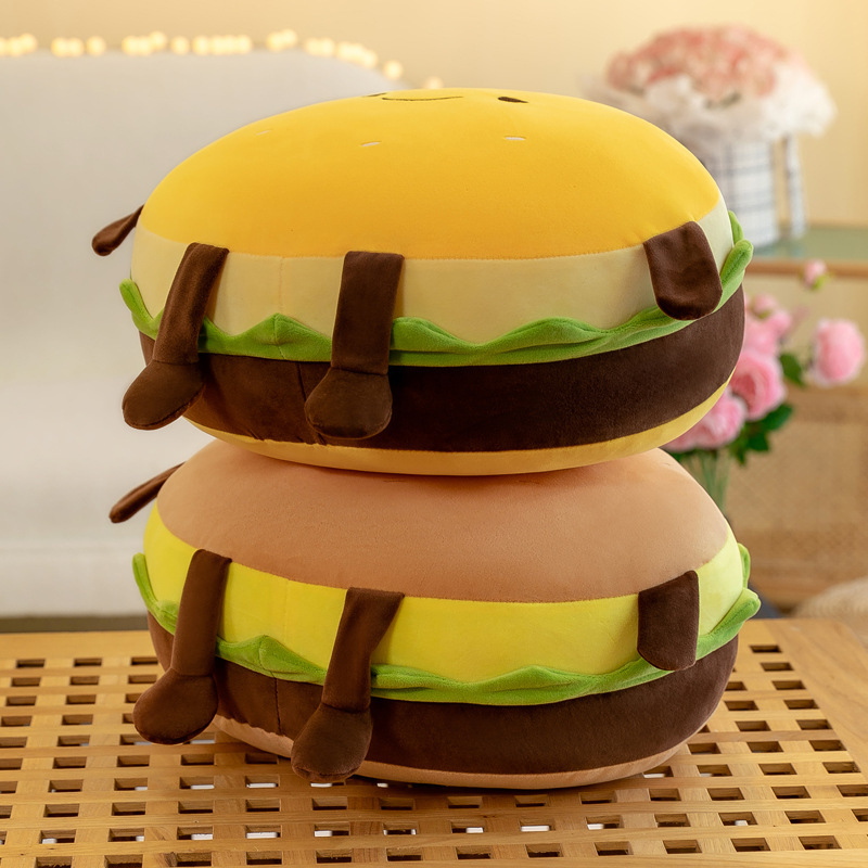 Side view of cute burger plush pillows showing layered burger details, soft plush fabric, rounded shape, and thick cushion design for hugging and decorating cozy spaces