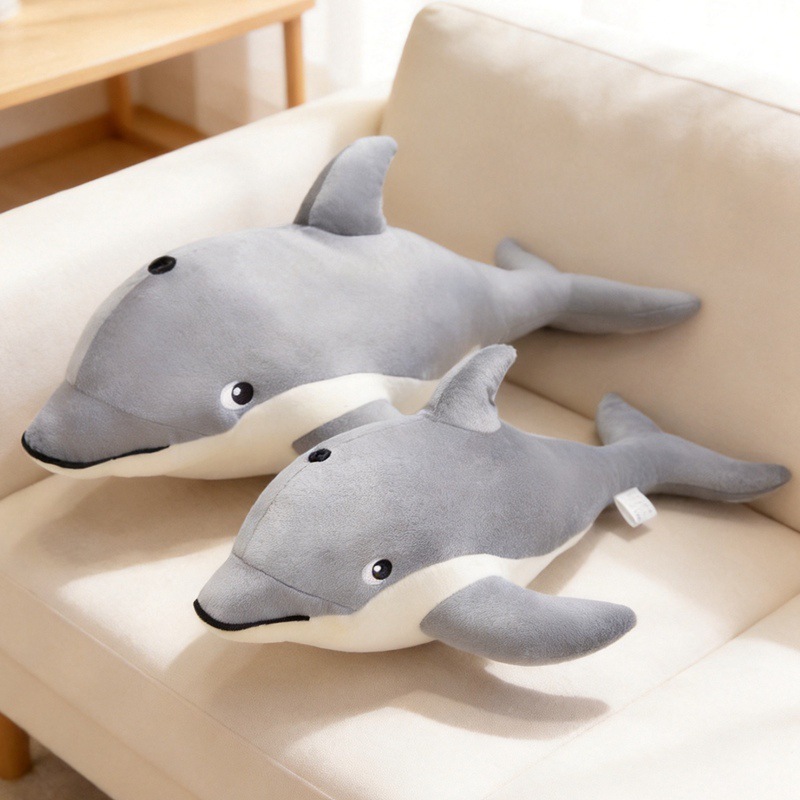Cute Dolphin Plush Pillows on a sofa for cozy home decor and everyday comfort