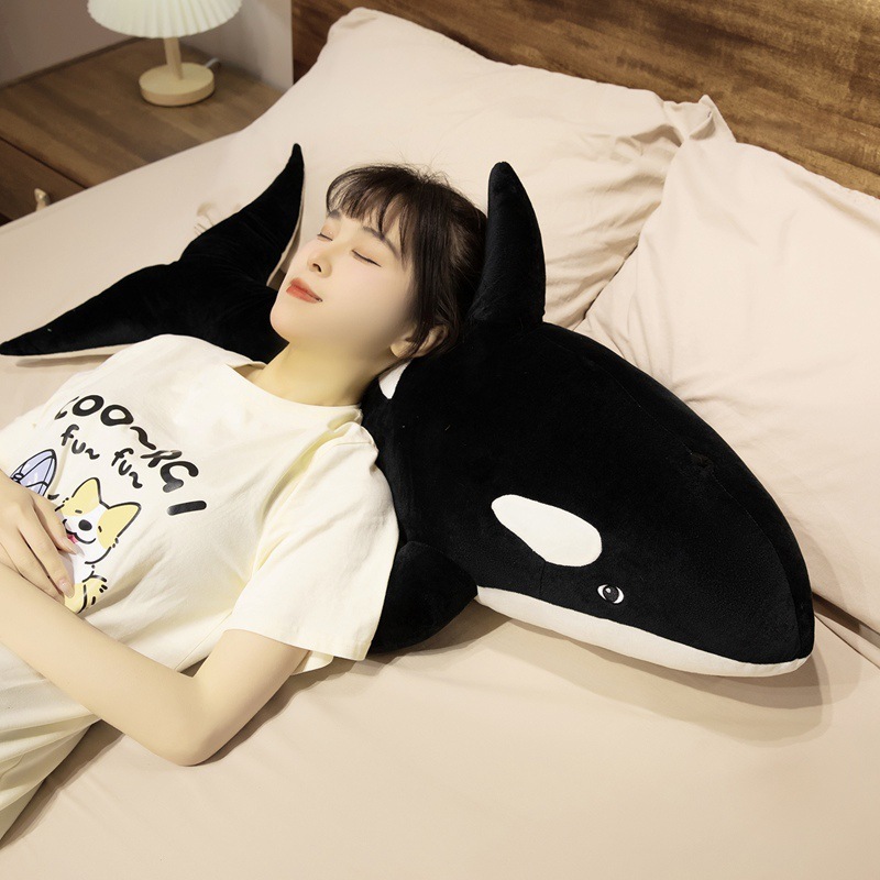 Orca Killer Whale plush pillow used as a soft sleeping pillow, providing cozy support for resting, lounging, and bedtime comfort