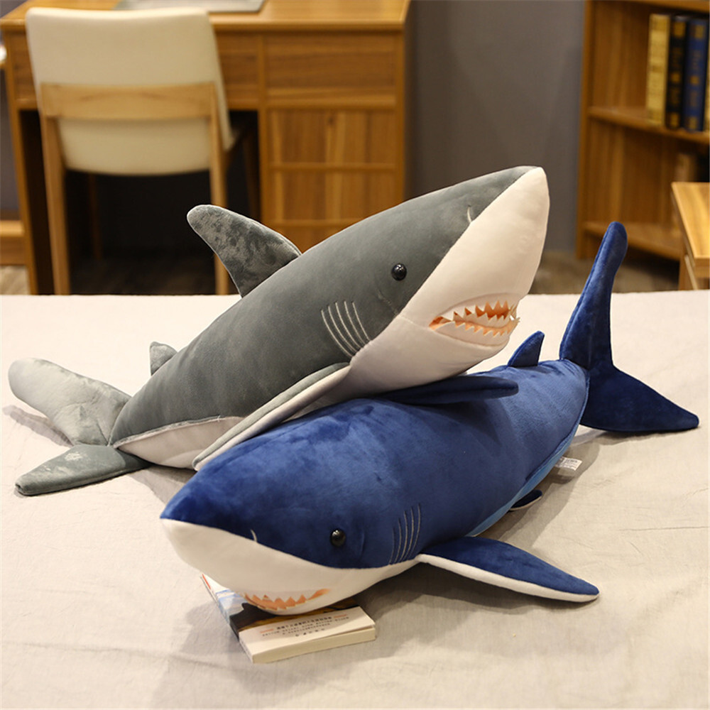 Blue and Gray Megalodon Shark Plush Toys featuring realistic shark faces, soft plush fabric, and cuddly comfort