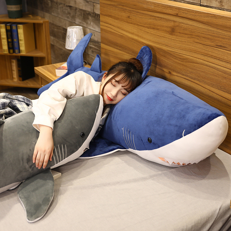 Megalodon Shark Plush Toys providing cozy support for hugging, lounging, and resting on a bed
