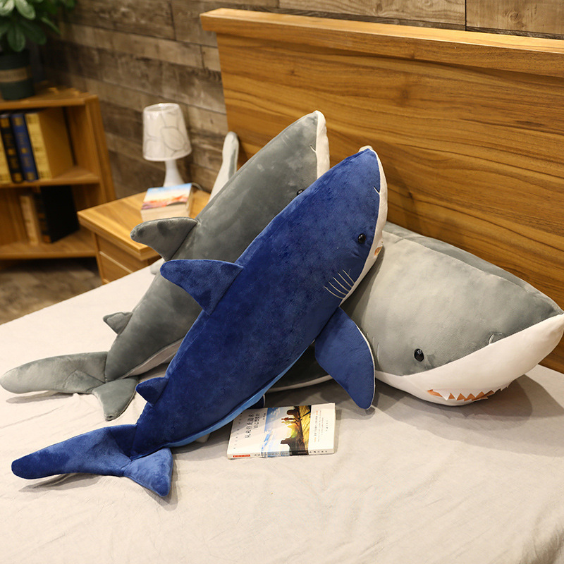 Blue and Gray Megalodon Shark Plush Toys displayed from different angles, highlighting realistic shark details and soft plush fabric
