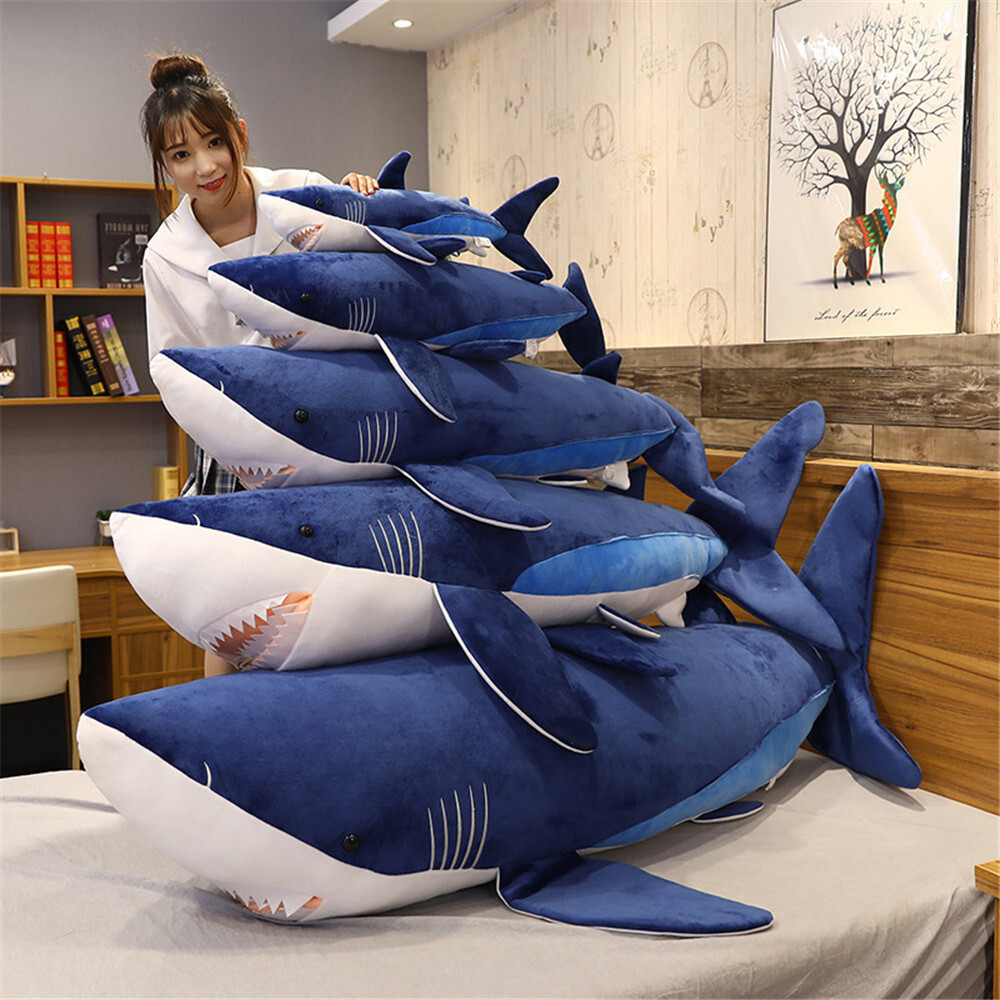Megalodon Shark Plush Toys available in multiple sizes, showcasing soft plush companions for hugging and display
