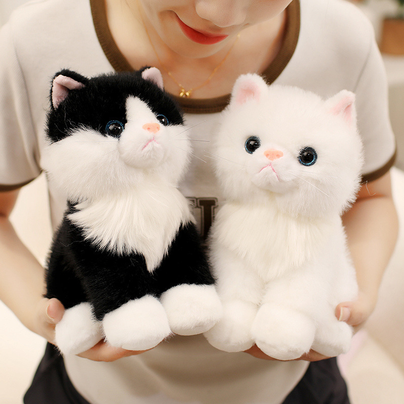 Black and White Realistic Cat Plush Toys with fluffy fur and lifelike sitting kitten designs