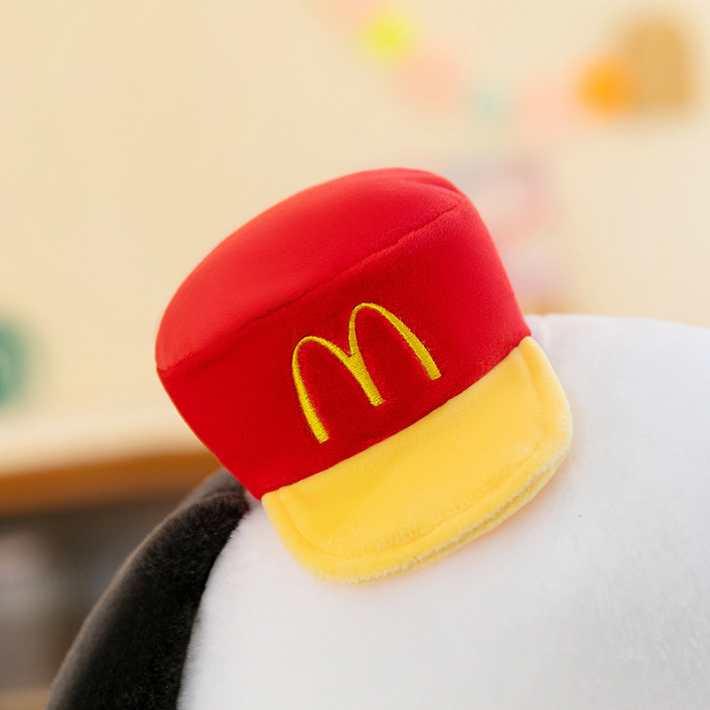Close-up of the red cap with embroidered details on the Cute Burger Dog Plush Toy