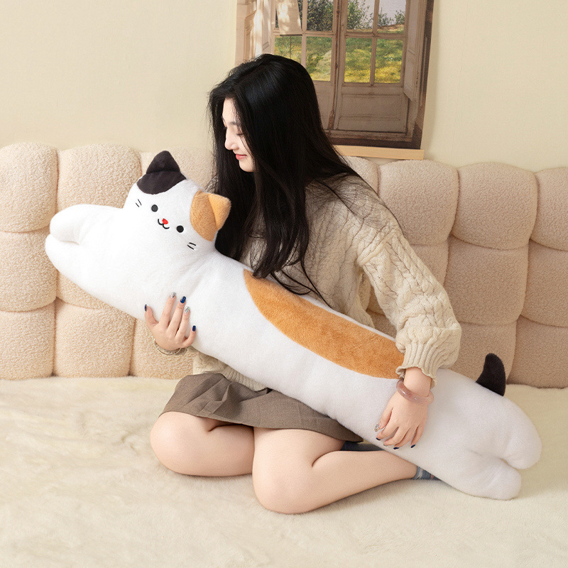 Calico Cat Long Plush Pillow with a soft elongated body, ideal for hugging, relaxing, reading, and adding a cozy touch to the bedroom
