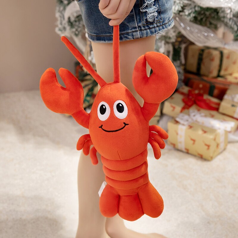 35 cm Cute Lobster Plush Pillow with a cheerful lobster design, soft plush fabric, and oversized claws, ideal for cuddling or displaying on a bed or sofa