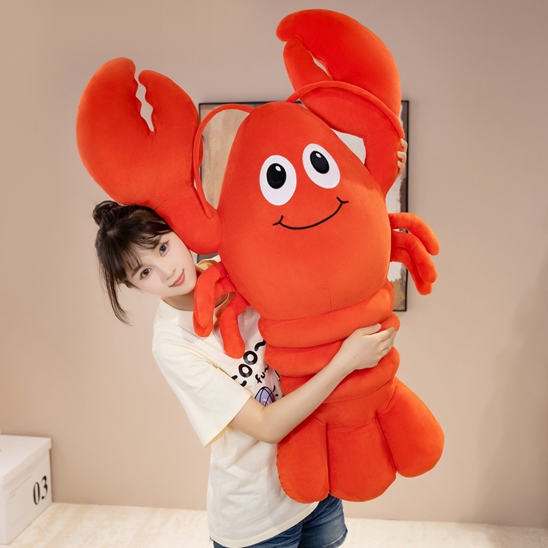 Cute Lobster Plush Pillow featuring bright red plush fabric, friendly embroidered face, and oversized claws for a fun, cuddly, and comforting companion