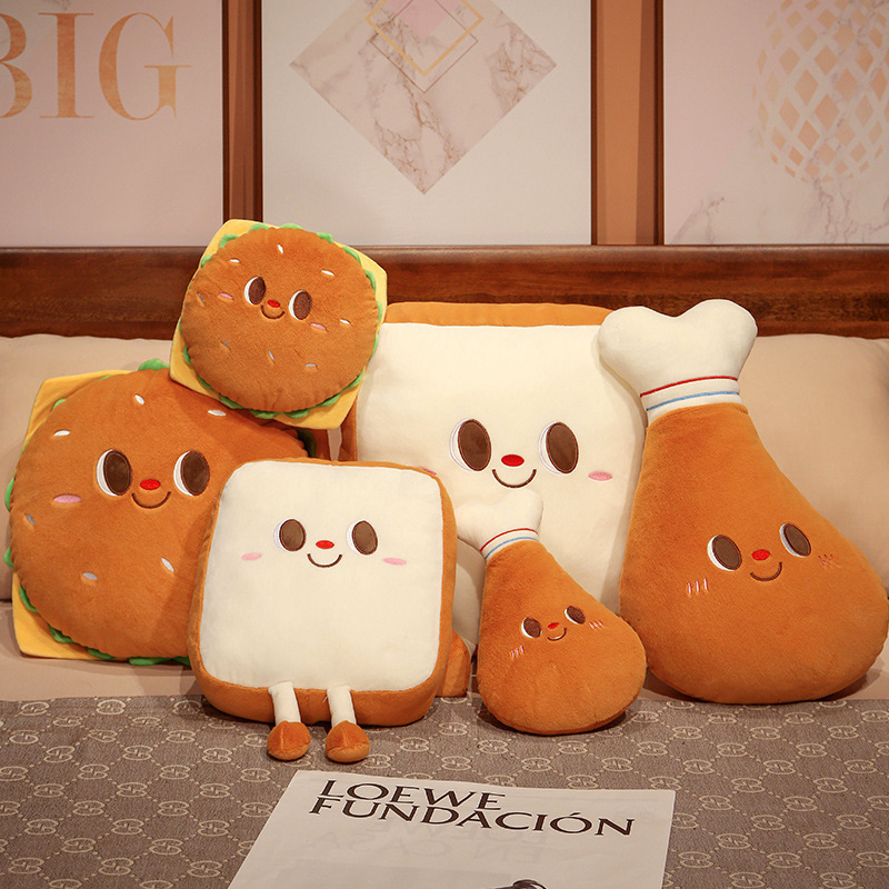 Burger, Toast and Chicken Drumstick Plush Pillows displayed on a bed for cozy home decor