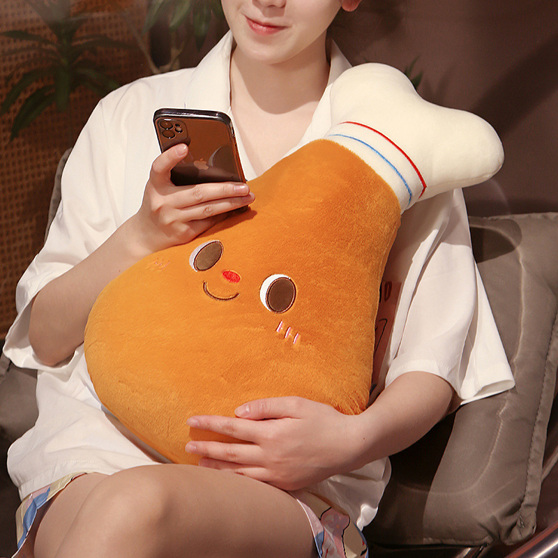 Chicken Drumstick Plush Pillow providing cozy support while relaxing on a sofa