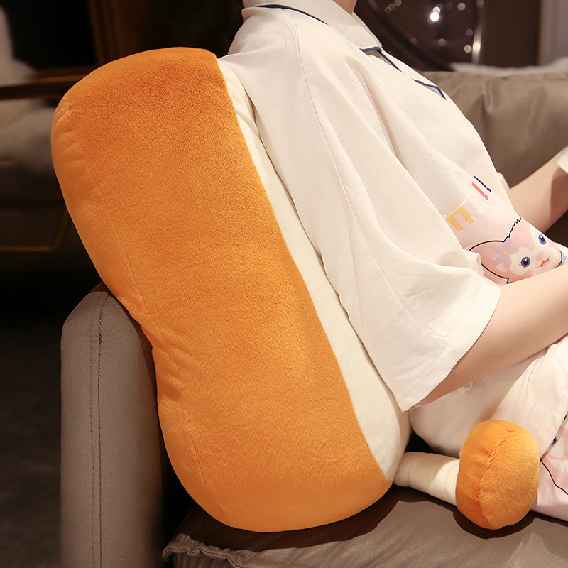 Toast Plush Pillow used as a soft back cushion on a sofa for extra comfort