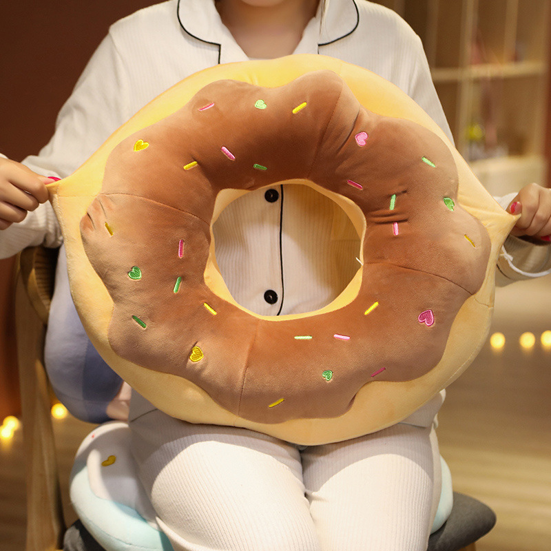 Chocolate Donut Plush Pillow featuring soft plush fabric, embroidered sprinkles, and realistic donut-inspired details
