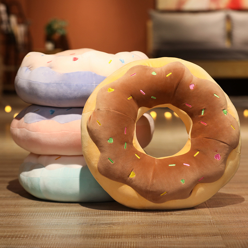 Chocolate Donut Plush Pillow featuring soft plush fabric, embroidered sprinkles, and realistic donut-inspired details