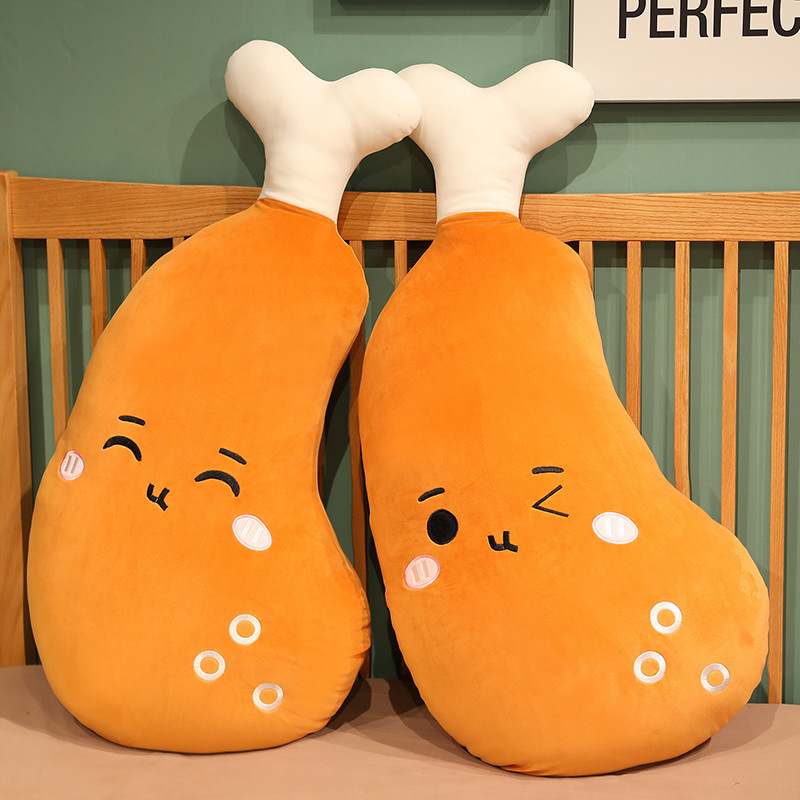 Cute Chicken Drumstick Plush Pillow with Winking and Smiling Eyes expressions, soft plush fabric, cozy pillow for hugging, relaxing, and bedroom decor