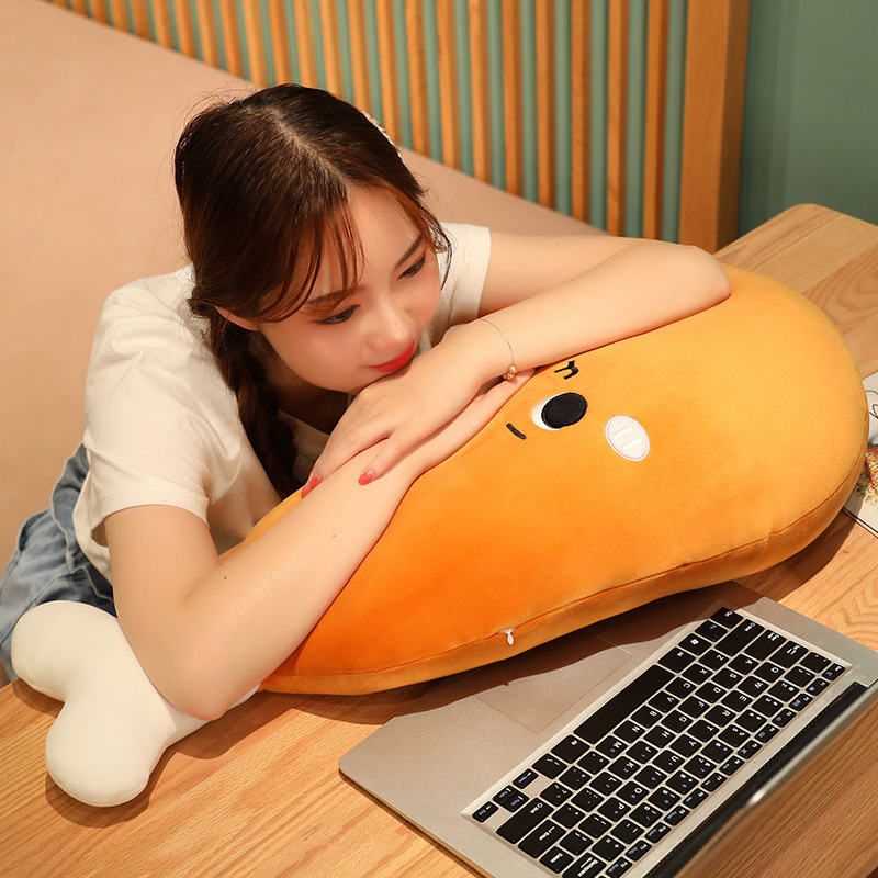 Round Eyes Chicken Drumstick Plush Pillow used as a soft desk pillow for resting, reading, and relaxing