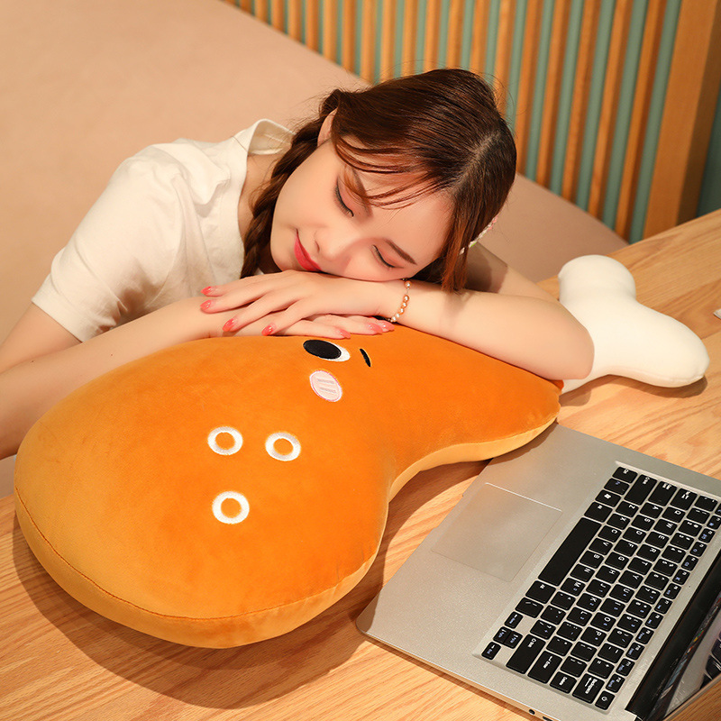 Round Eyes Chicken Drumstick Plush Pillow used as a soft desk pillow for naps, resting, and comfortable everyday use