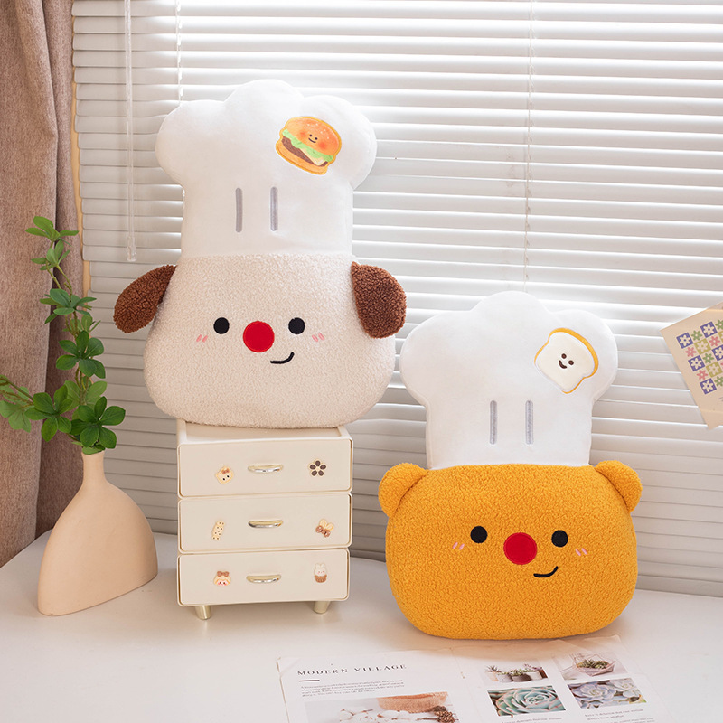 Chef Dog and Chef Bear plush pillows with soft chef hats, fluffy plush fabric, and embroidered faces, adding cozy comfort and playful charm to any living space