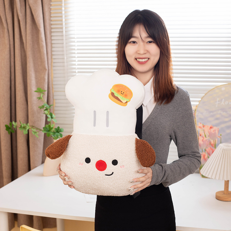 Chef Dog plush pillow featuring a fluffy chef hat, soft plush texture, embroidered face, and adorable food-themed design, perfect for cuddling, relaxing, and cozy home decor