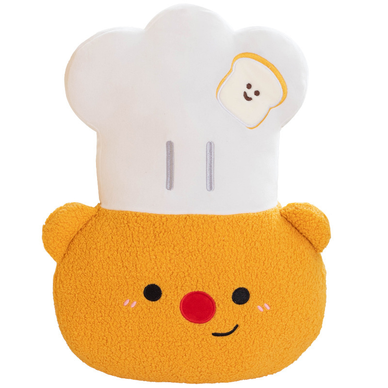 Chef Bear plush pillow with a soft white chef hat, embroidered toast patch, fluffy plush fabric, and adorable embroidered face