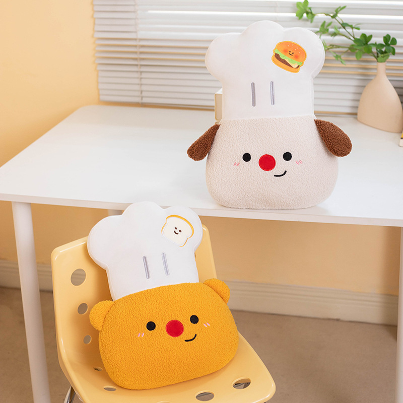 Chef Dog and Chef Bear plush pillows displayed on a chair and tabletop, creating a warm, cheerful atmosphere for bedrooms, living rooms, and cozy home decor