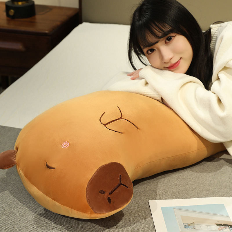 Capybara Long Plush Pillow used as a soft support pillow for relaxing, reading, taking a nap, or adding cozy comfort to a bedroom
