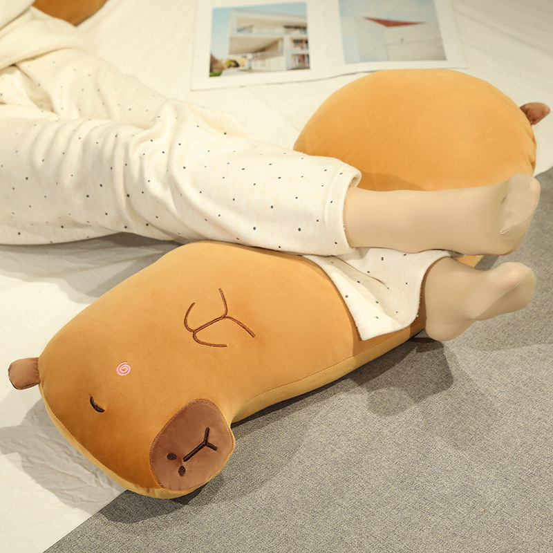 Capybara Long Plush Pillow used as a soft leg support pillow for lounging, relaxing, and everyday comfort