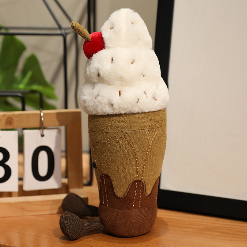 Chocolate Milkshake Plush Toy showcasing the fluffy whipped cream topping, embroidered chocolate drizzle, cherry detail, and soft plush texture