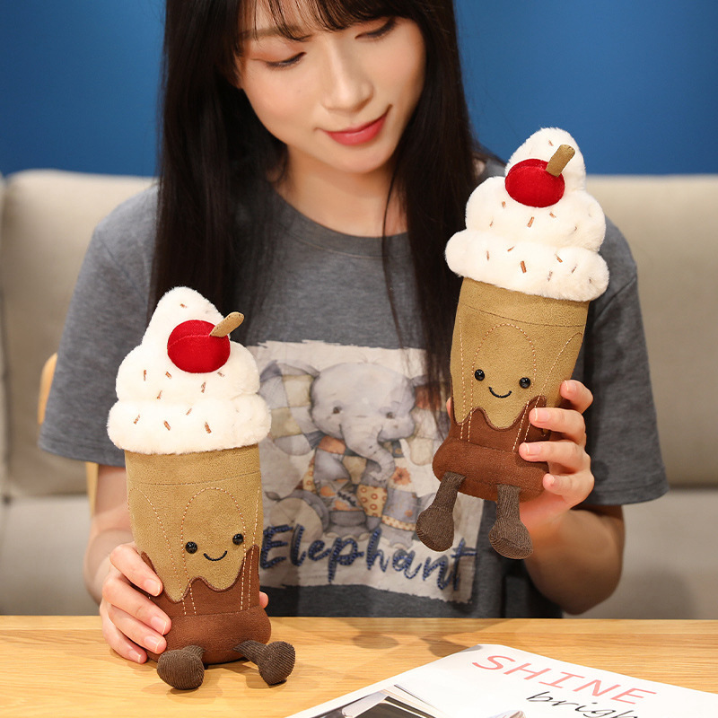 Cute Chocolate Milkshake Plush Toys with soft plush fabric, fluffy whipped cream, cherry topping, and dangling legs for display or gifting