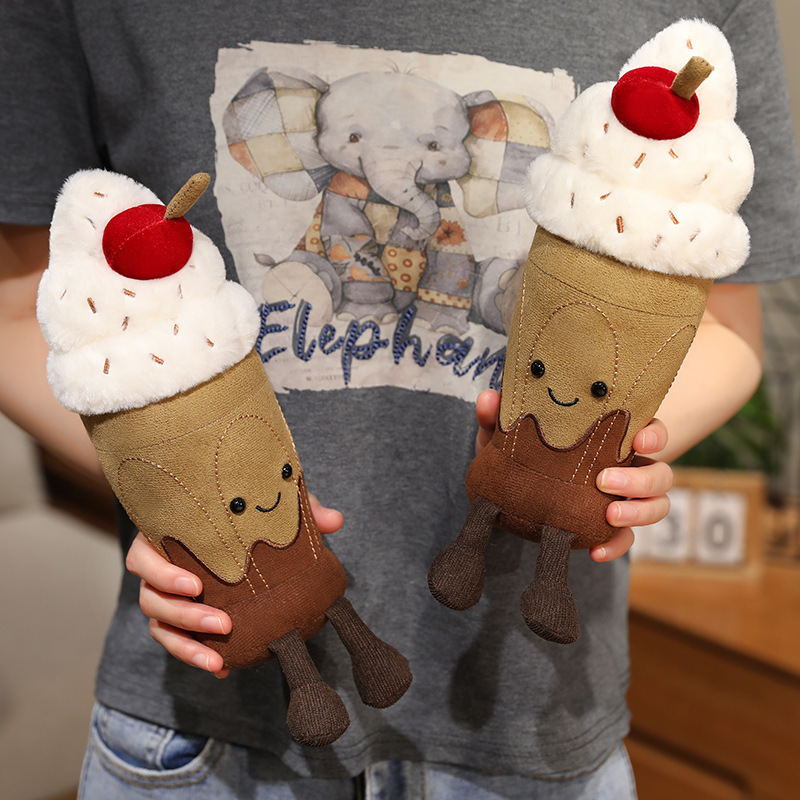 Chocolate Milkshake Plush Toys displayed together with fluffy whipped cream, cherry topping, smiling embroidered faces, and dangling legs