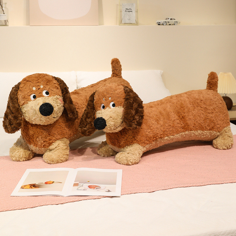 Dachshund Plush Pillows on a bed, showcasing their long plush bodies and soft texture for hugging, relaxing, and decorating bedrooms
