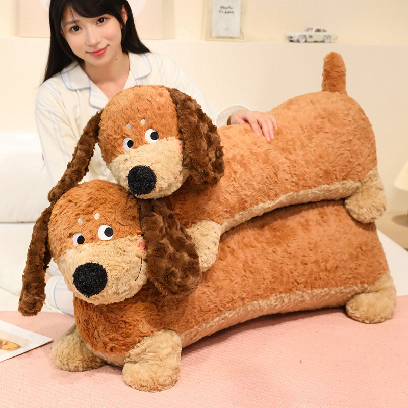 Dachshund Plush Pillow stacked on a bed, showcasing its long body, soft plush texture, and cozy design for hugging, relaxing, and decorating bedrooms