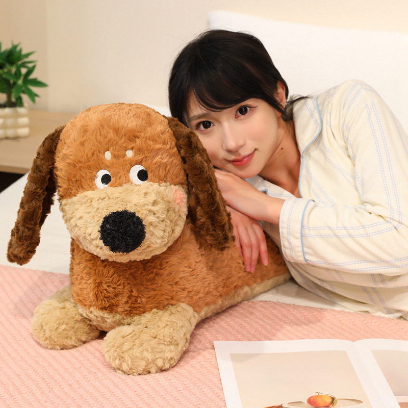 Dachshund Plush Pillow beside a bed, showcasing its long body, soft plush texture, and cozy design for relaxing and bedroom decor